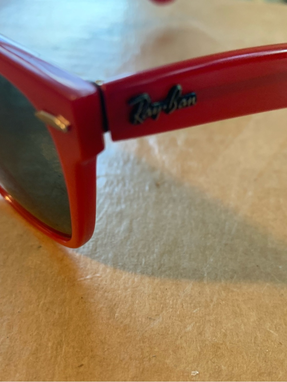 Ray-Ban Red Sunglasses with Dark Lenses